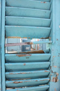 Close-up of rusty metal on steps