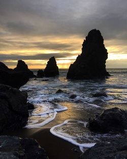 Scenic view of sea at sunset