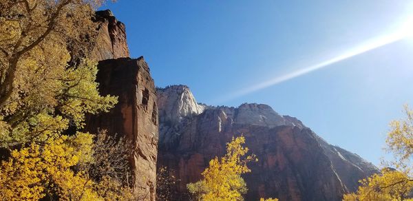 Low angle view of rocks against sky