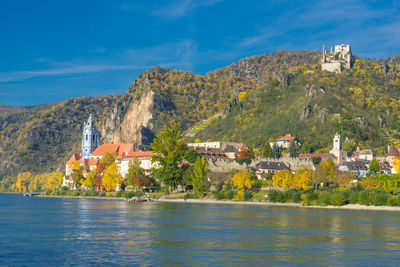 Stift durnstein amidst buildings against sky