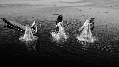 High angle view of fishermen fishing on inle lake