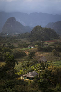 Scenic view of landscape and mountains against sky