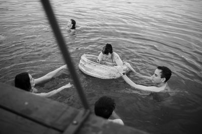 High angle view of man swimming in lake