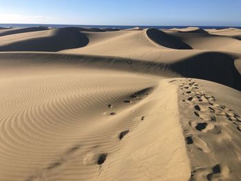 Scenic view of desert against sky