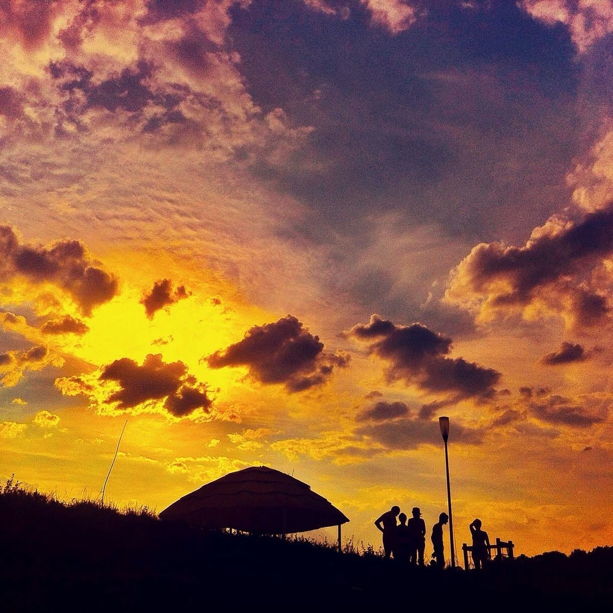 sunset, silhouette, sky, cloud - sky, orange color, built structure, architecture, low angle view, beauty in nature, dramatic sky, cloud, scenics, cloudy, nature, tree, dusk, building exterior, tranquility, tranquil scene, outdoors