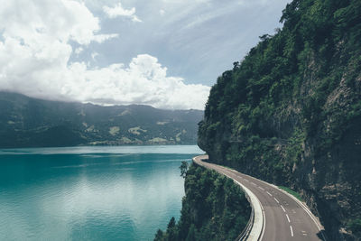 Country road leading towards mountains