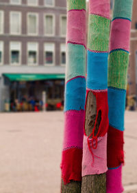 Low section of woman standing on colorful floor