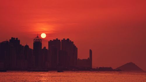 Silhouette of buildings at sunset