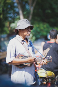 Man playing with umbrella