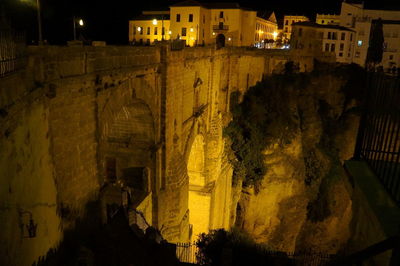 Buildings in city at night