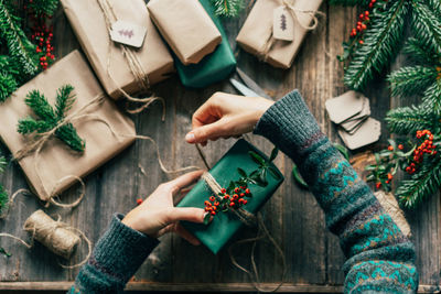 Midsection of woman holding gift