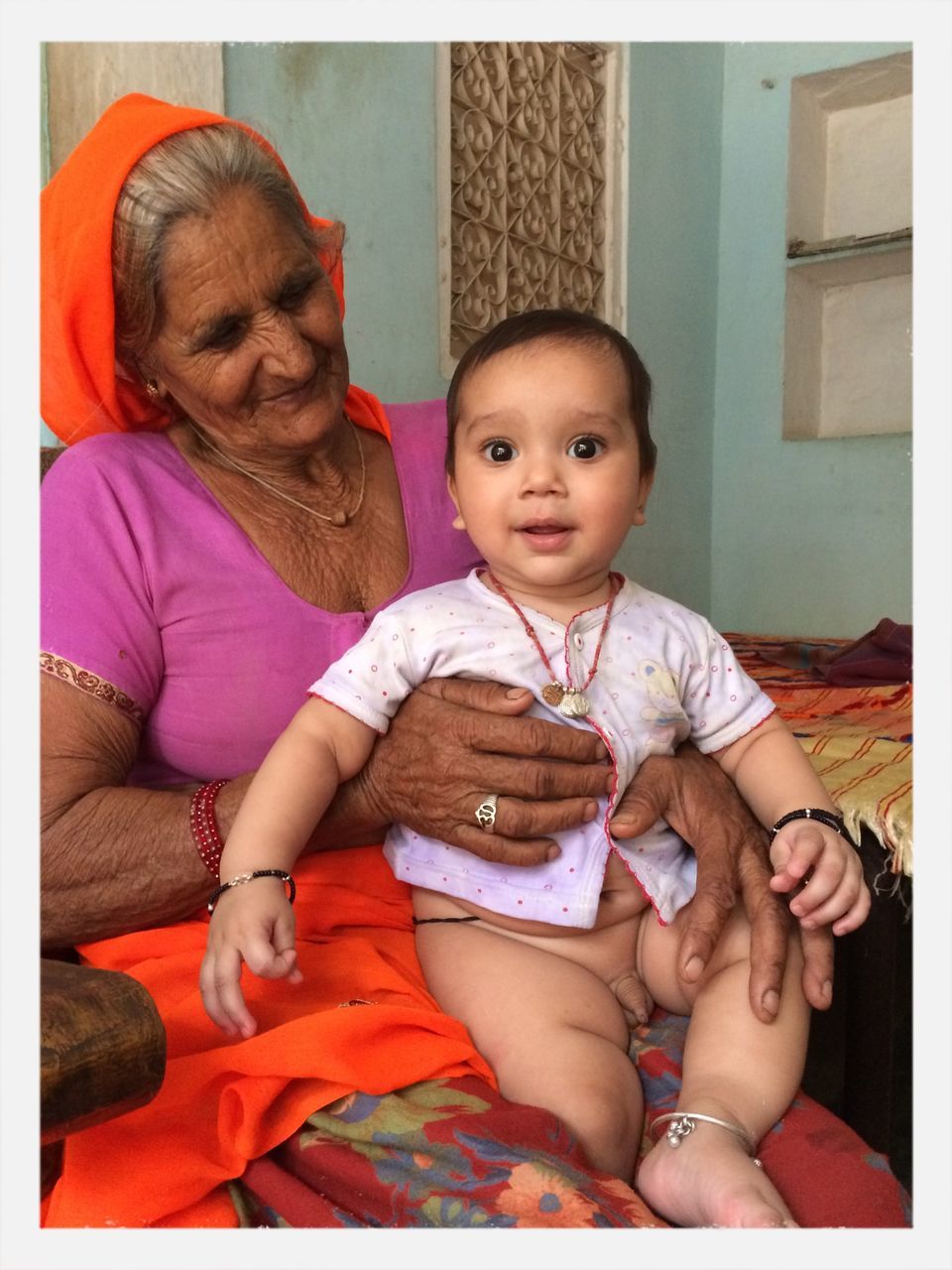 indoors, person, childhood, transfer print, elementary age, innocence, home interior, cute, togetherness, baby, bonding, looking at camera, auto post production filter, portrait, toddler, sitting, bed, girls