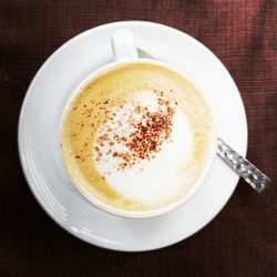 Directly above shot of coffee cup on table