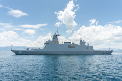 Ship in sea against sky