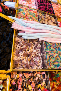 High angle view of multi colored candies for sale at market stall