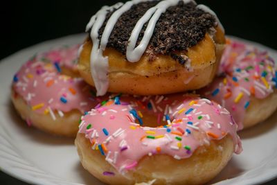 Close-up of donuts in plate