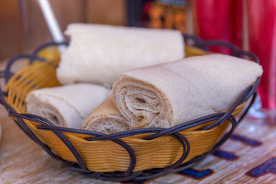 Close-up of bread in basket on table