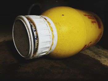 Close-up of beer bottle on table