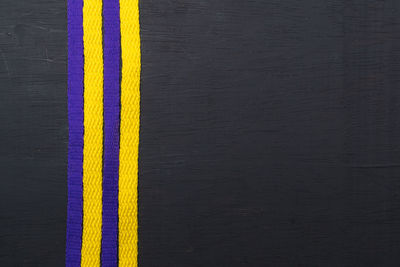 High angle view of blue paint on black background