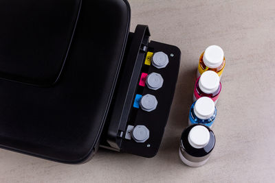 High angle view of bottles on table