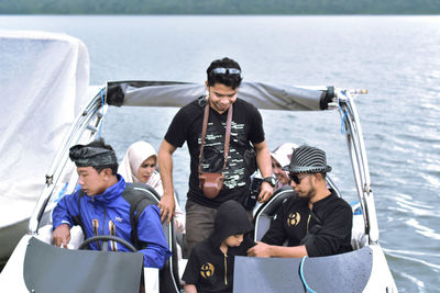 Portrait of friends on boat