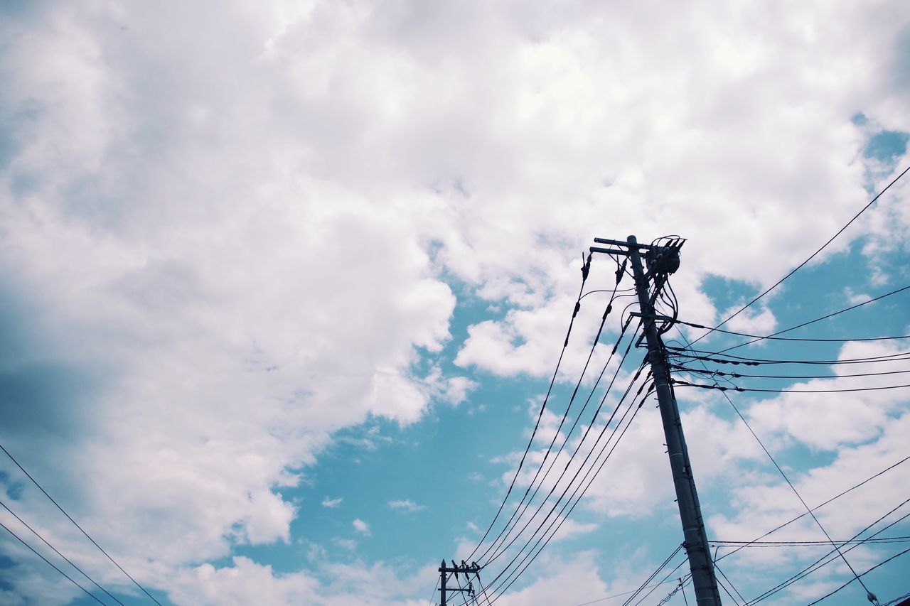 LOW ANGLE VIEW OF COMMUNICATIONS TOWER AGAINST SKY