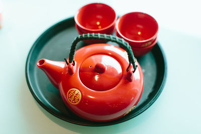 High angle view of red water in bowl