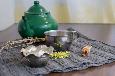 Close-up of tea cup on table