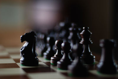 Close-up of chess pieces on board