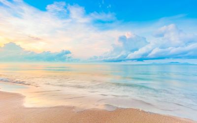 Scenic view of beach against sky during sunset