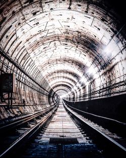 Railroad tracks in tunnel