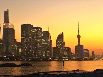 View of buildings against sky during sunset