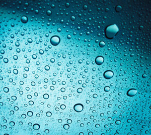 Full frame shot of water drops on glass