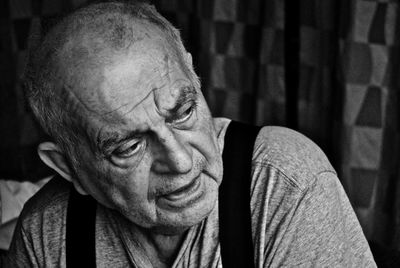 Close-up of mature man looking away