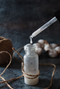 Organic homemade zero waste cosmetics concept. skincare serum on dark background. 