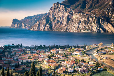 High angle view of townscape by sea