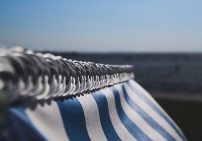 Close-up of striped textile at beach