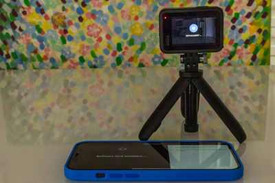 Close-up of digital camera on table