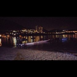 Illuminated cityscape at night