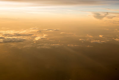 Aerial view of clouds against sky during sunset