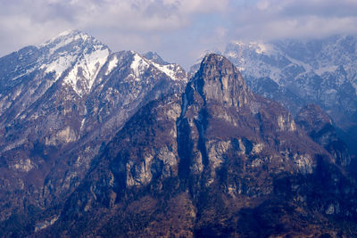 Scenic view of mountains against sky during winter
