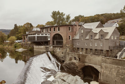 Overlooking ottauquechee river falls in the new england town of quechee, vermont 