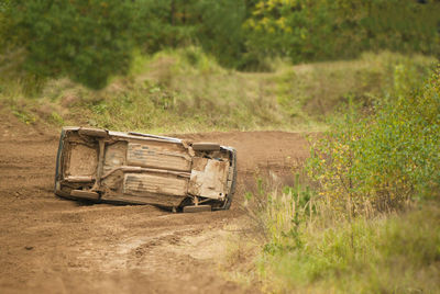 Abandoned truck on field