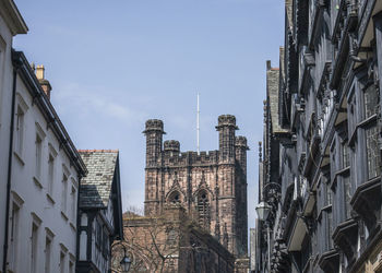 Low angle view of buildings against sky, chester 