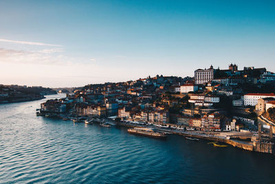 High angle view of douro river by buildings against sky