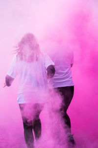 People dancing against sky