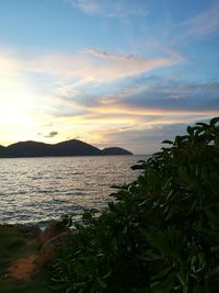 Scenic view of sea against sky at sunset