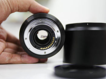 Close-up of hand holding camera
