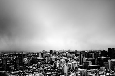 High angle view of buildings in city against sky