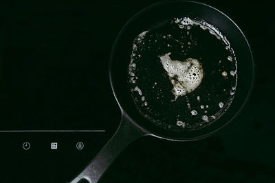 Directly above shot of breakfast on black background